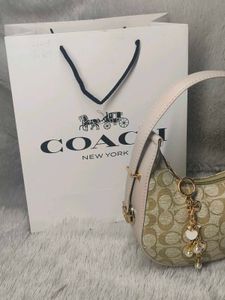 Coach Moon with charm&amp; Carry bag