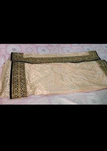 Elegant Beige Embroidered Saree