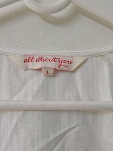 Chic White Sleeveless Wrap Top