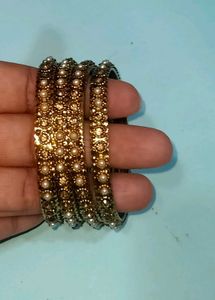 Elegant Gold Bangles with Pearl Embellishments