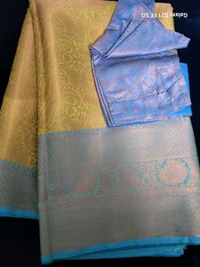 Elegant Yellow Saree with Blue Blouse Piece