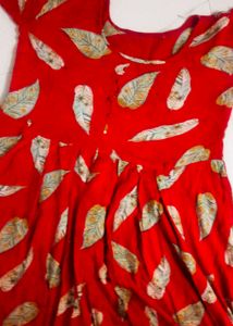 girls red frock + gift