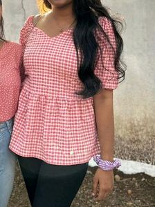 Gingham print pink peplum top