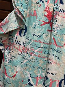 womens graphical print long top with bell sleeves