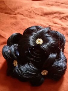 Elegant Hair Bun with Embellishments