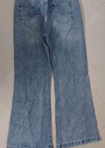 Light Wash Flared Jeans with Studs