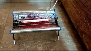 IT IS A 1000W PRINCE MYSORE ROOM HEATER.......