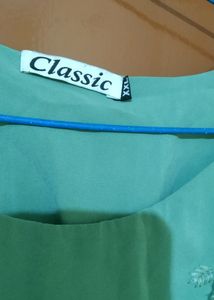 Aqua Green Top With Embroidery Design In The Front And Bell Sleeve