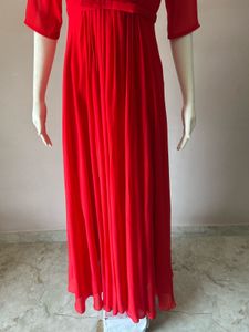 Elegant Red Gown with Embellished Neckline