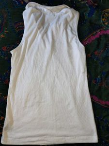 Sleeveless White Ribbed Polo Top