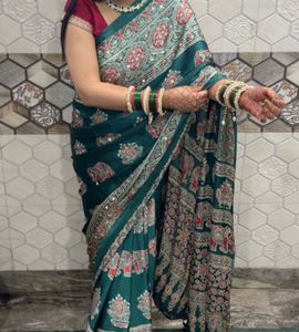 Elegant Teal Saree with Elephant Print