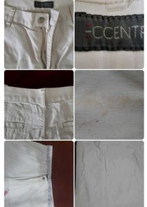 Off-white formal trousers for men.