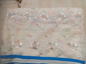 Embroidered Cream Saree with Blue Border