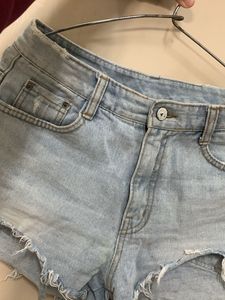 Light Wash Distressed Denim Shorts
