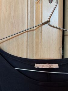 Stylish Black Top with Dramatic Sleeves