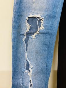 Select Skinny Distressed Jeans