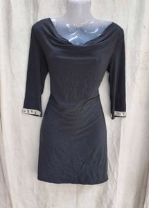 Elegant Black Dress with Embellished Sleeves