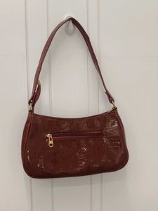Chic Burgundy Shoulder Bag with Gold Chain