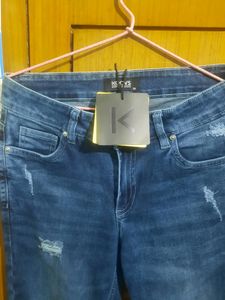 Distressed Slim Fit Jeans