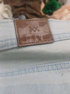 Light Wash Distressed Denim Shorts
