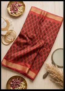 Beautiful Red Saree with Intricate Black Motifs