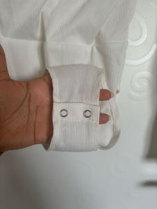 Chic White Long-Sleeve Bodysuit
