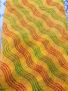 Vibrant Yellow Saree with Wave Pattern