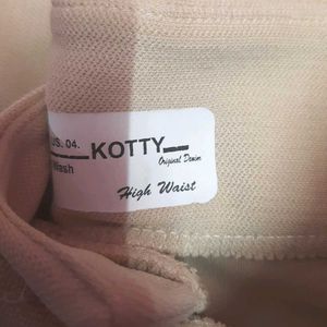 Beige High-Waist Women's trousers.