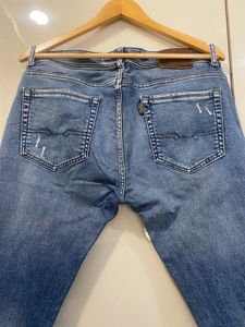 Distressed Denim Jeans