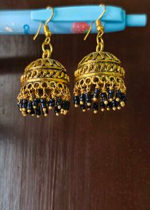 Traditional Gold Jhumka Earrings with Black Beads