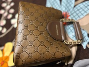 Women Stylish Brown Handbag with Chain Detail