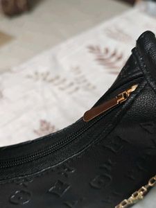 Chic Black Embossed Hobo Bag with Charms