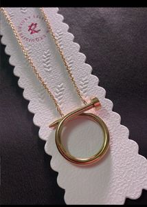 Elegant Gold Nail Ring Pendant Necklace