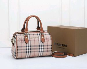 IMPORTED BURBERRY DUFFLE TYPE SLING WITHOUT BOX