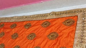 Vibrant Orange Embellished Lehenga Choli