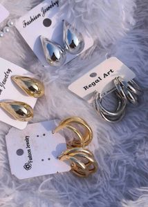 Korean Studs Silver And Gold One Pair 99