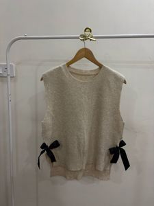 Cream Ribbed Vest Sweater with Black Bow detailing