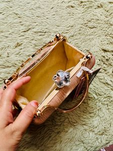 Elegant Rose Gold Clutch Bag