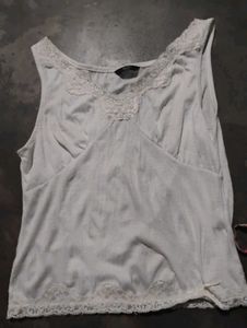 white hand stitched sleeves top