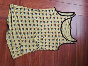 24) Patterned Sleeveless Reebok Top