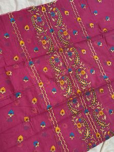 Pink embroidered fabric.