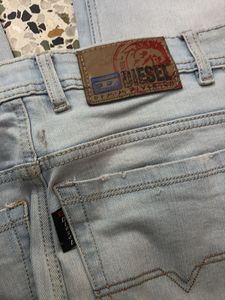 Light Wash Distressed Denim Jeans