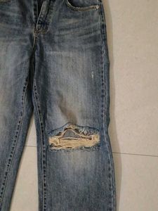 Distressed Blue Denim Jeans