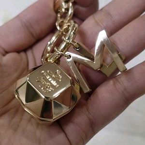 lady million bag charm