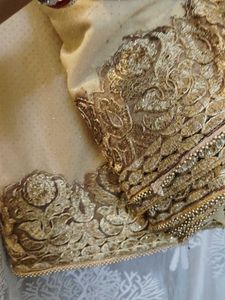 Elegant Golden Embroidered Saree