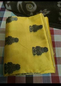 elegant yellow lichi silk saree new with tag