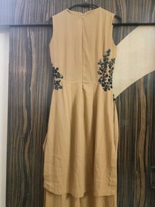 Elegant Beige Jumpsuit with Embellishments