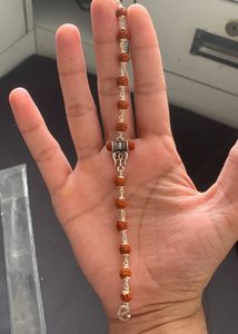 Rudraksha Bracelet with Silver Charm