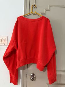 Vibrant Orange Cropped Sweatshirt