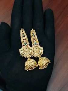 Gold Jhumka Earrings with Green Stones